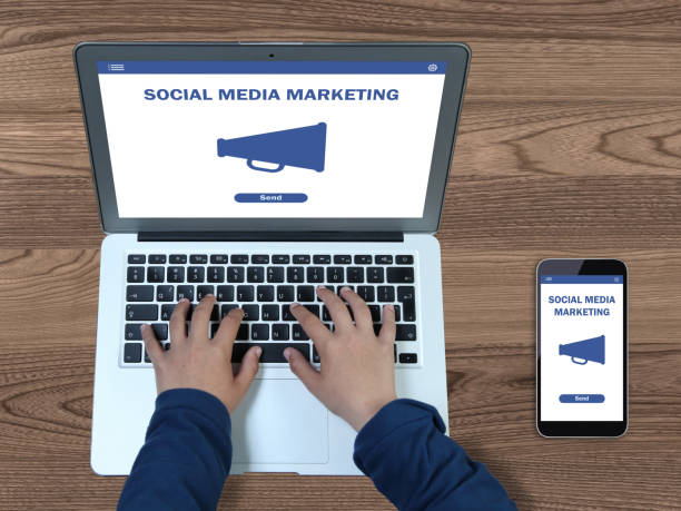 istock Social media marketing network communication laptop tablet 1134036811