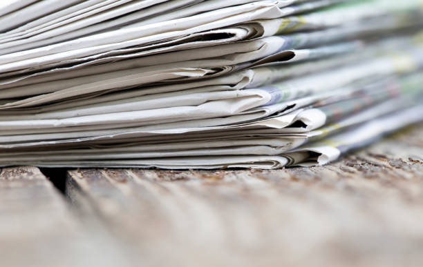 istock Morning news concept - newspapers stack close-up with copy space 1134041561