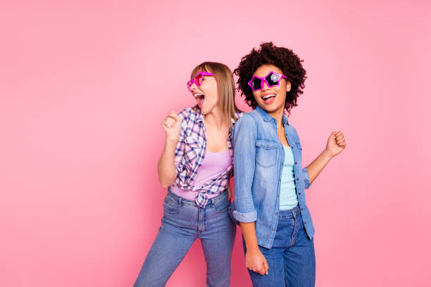 portrait of two person nice cool lovely fascinating fashionable attractive charming cheerful girls wearing casual checkered shirt having fun isolated over pink pastel background - shirt women pink jeans imagens e fotografias de stock