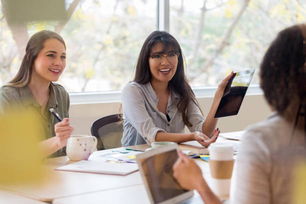 istock Young design professional uses digital tablet to share ideas 1134044971