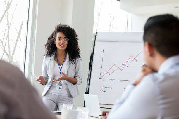 istock Businesswoman gives presentation 1134045123