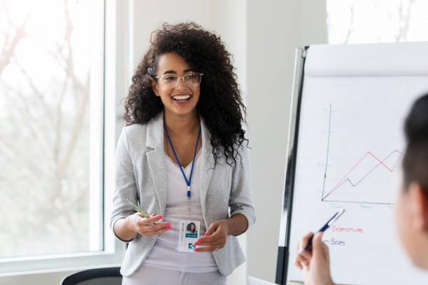 istock Pharmaceutical sales representative answers questions during meeting 1134045129