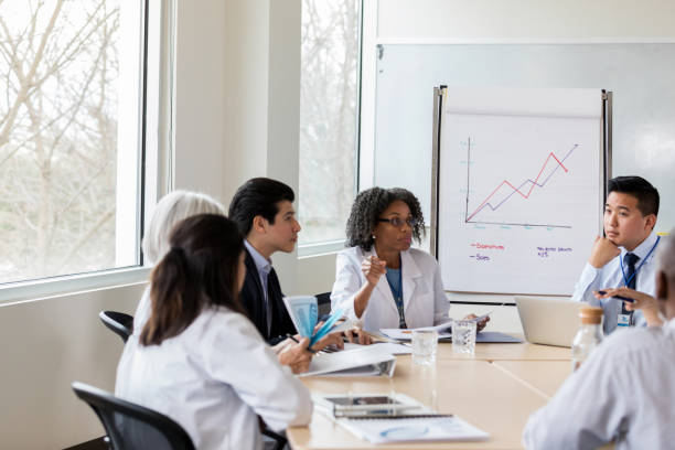 istock Doctors and hospital administration discuss hospital policy 1134045140
