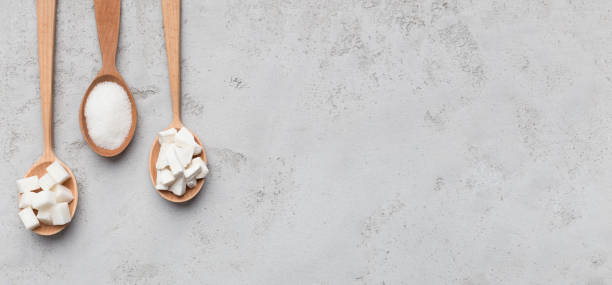 istock Collection of different kinds of sugar on gray background 1134045351
