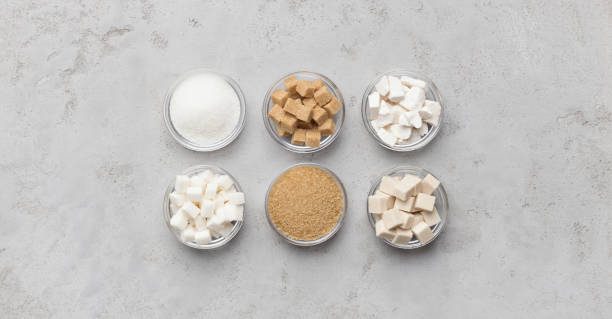 istock Collection of different kinds of sugar on gray background 1134045361