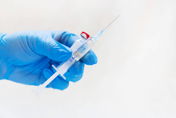 istock an injection in the hands of the nurse. selective focus. 1134045471