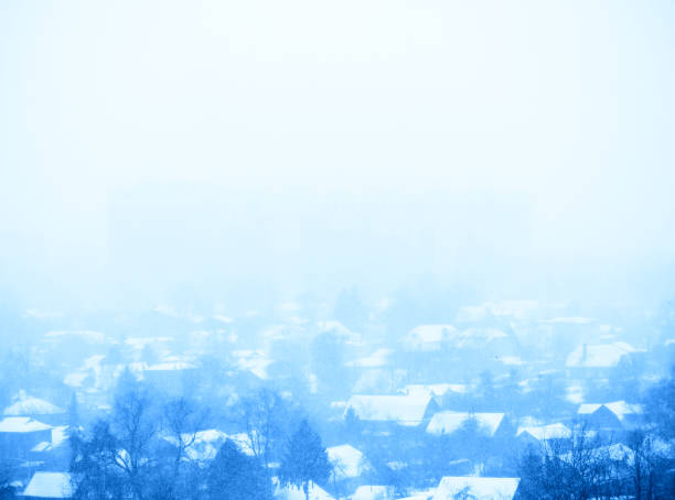 Snowing at Russian suburbs winter background