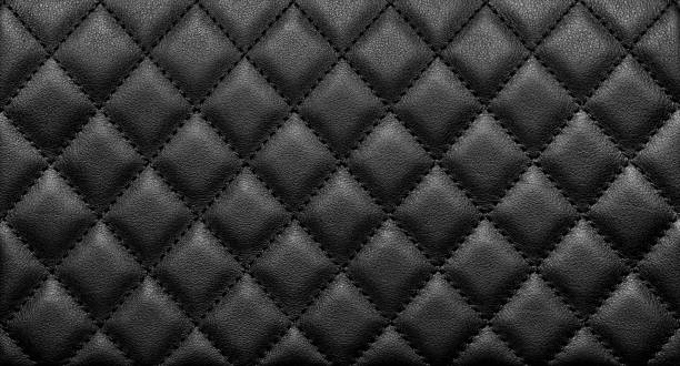 黒菱形のステッチと本物の革のクローズアップテクスチャ - natural pattern ストックフォトと画像