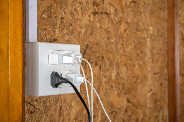 istock The old electrical plug next to the cream wall. 1134050293