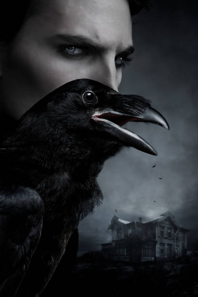 istock Spooky portrait of a man with raven 1134051994