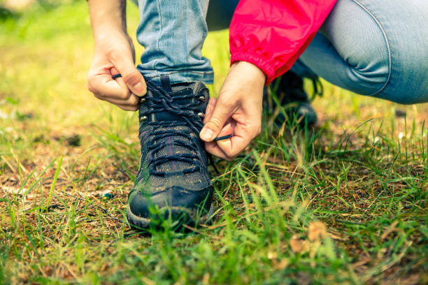 istock Image of woman tying shoelaces 1134053329
