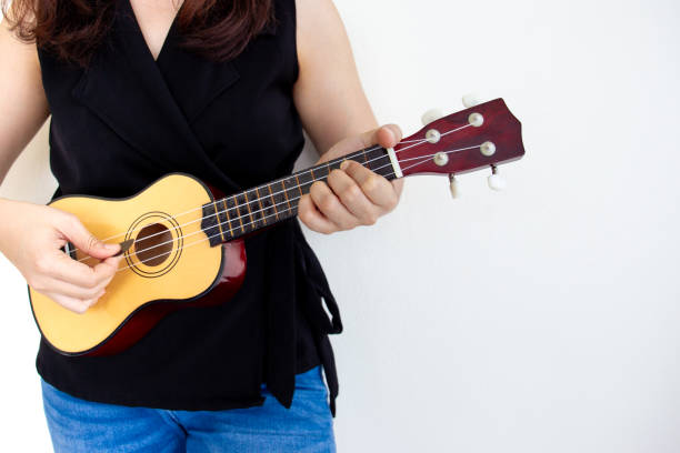 istock Girl playing an Ukulele. 1134053926