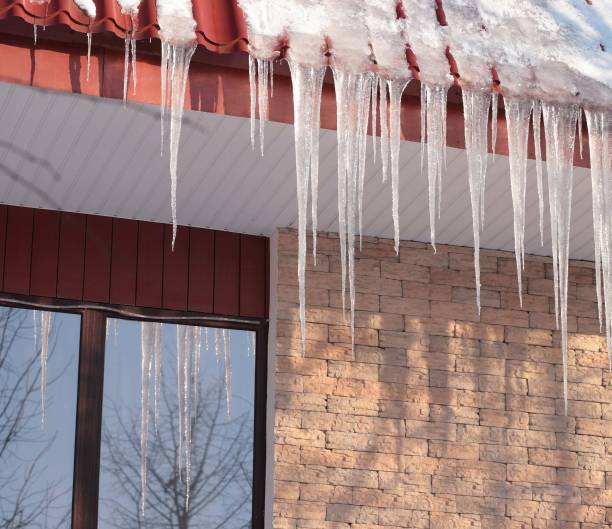 istock icicles on building roof at winter day 1134056471