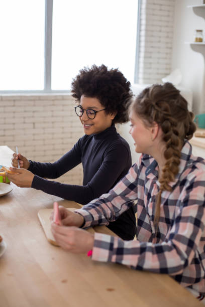istock Pleased kids going to have lunch together 1134056662