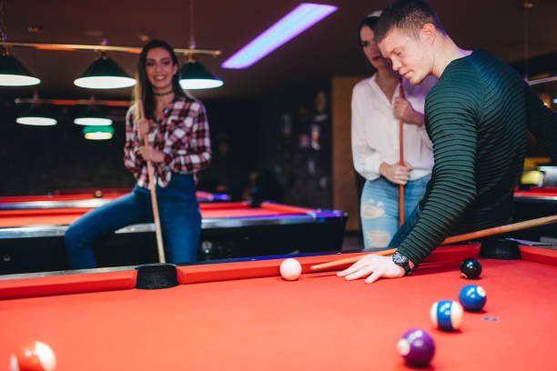 istock Playing snooker with friends 1134057884