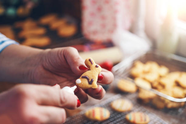 istock Decorating Easter Cookies with Colorful Icing 1134058380