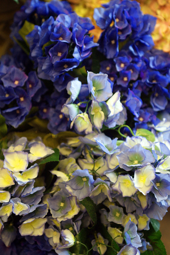 istock Multicolored imitation flowers 1134058606