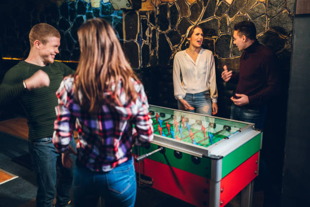 istock Playing table soccer with friends 1134059928