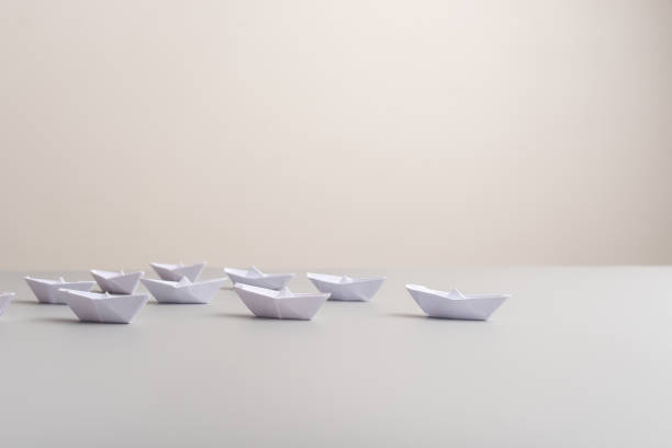 istock Paper made origami boats positioned in a pyramid shape 1134060039