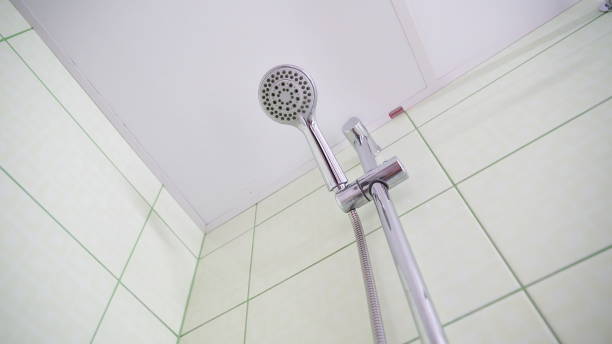 istock The silver shower inside the bathroom in the hotel room 1134062691