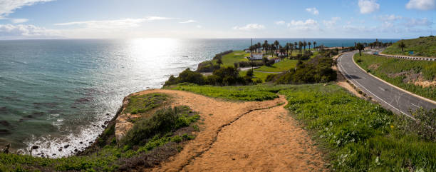 Point Vicente Panorama Breathtaking clifftop panorama of Point Vicente on a sunny day with Palos Verdes Drive winding along the Southern California coast, Rancho Palos Verdes, California rancho palos verdes stock pictures, royalty-free photos & images