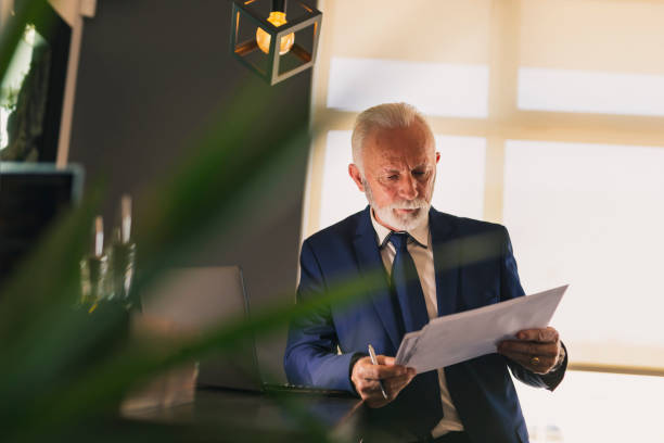 istock Senior businessman signing contract 1134065343