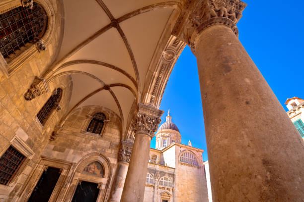 Dubrovnik street historic architecture and arches view, the Assumption Cathedral, Dalmatia region of Croatia