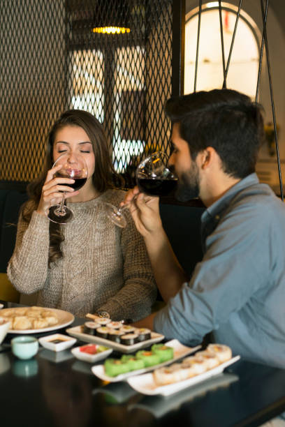 istock Young romantic couple in a restaurant 1134066008