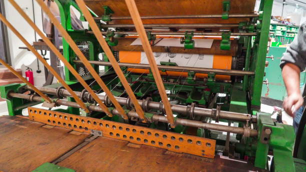 istock The big old manual printing machine inside the factory 1134066099