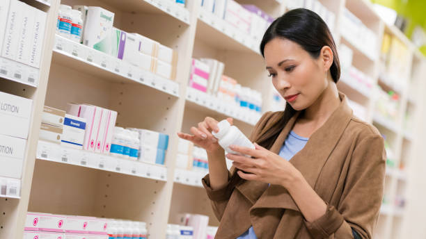 istock Woman Shopping At Pharmacy 1134066391