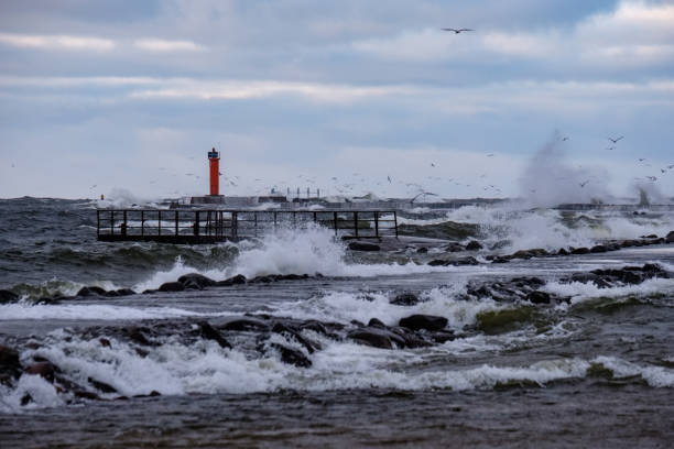 istock moderate storm in baltic sea near lighthouse 1134067128