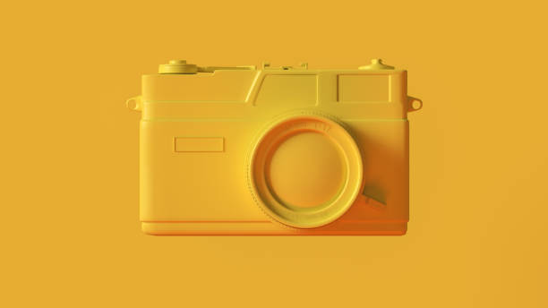 istock Yellow Vintage Camera with Adjustable Lens 1134067211