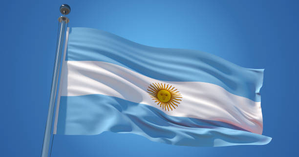 istock Argentina flag in the wind against clear blue sky, 3d illustration 1134067779