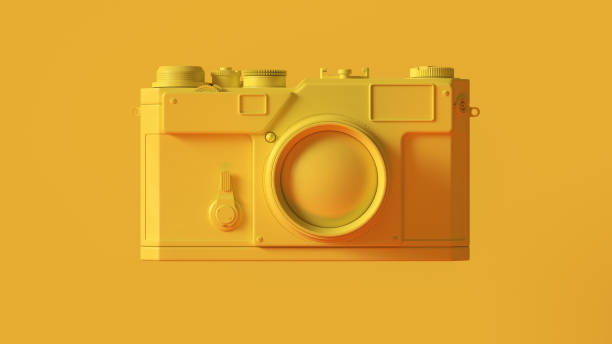 istock Yellow Vintage Camera with Adjustable Lens 1134067923