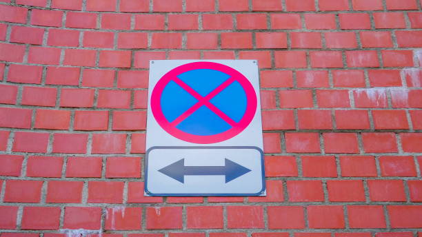 istock A small white signage pasted on the red brick wall 1134068873