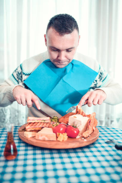 hipster male eating dinner - gourmet enjoyment food freshness imagens e fotografias de stock