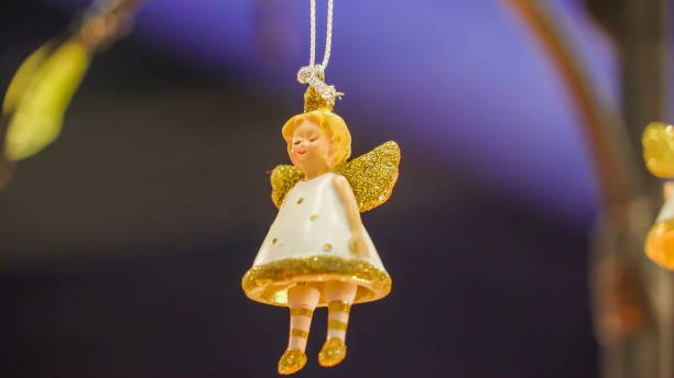An angel figurine hanging on the room as decoration