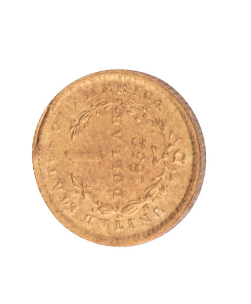 istock one gold 1852 dollar coin isolated on white background 1134073711