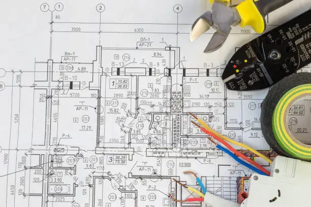 Photo of Still Life Of Electrical Components Arranged On Plans