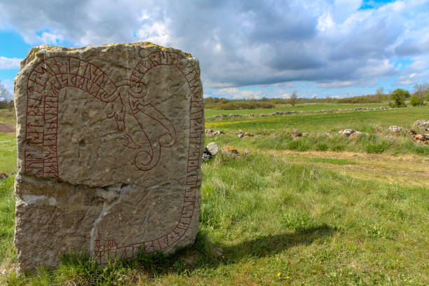 istock rune stone in the sun on Oland, Sweden 1134076916