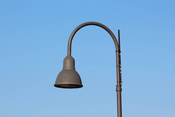 istock Tall dark grey modern public street lamp with LED light 1134078241