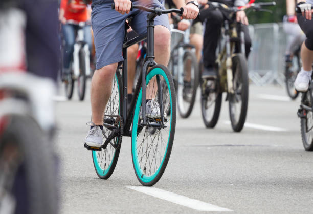 istock Many people ride by bicycles 1134079651