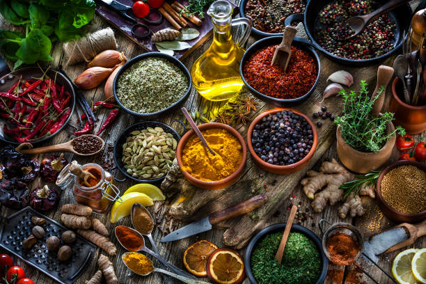 istock Spices and herbs on rustic wooden table 1134080444