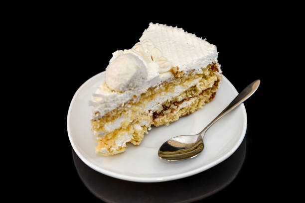 istock Piece of tasty cake on plate with reflection 1134083187