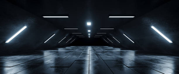 istock Sci Fi Futuristic Alien Spaceship  Dark Empty Grunge Concrete Reflective Tiled Floor And White Blue Glowing Led Lights Studio Hall Corridor Tunnel 3D Rendering 1134084503