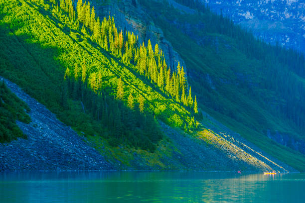 Lake Louise in Banff National Park, Alberta, Canada, during sunset. An HDR treatment was used to captured all the dramatic colours and tonal depth. 