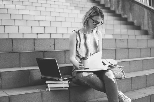 istock College girl studying on staircase 1134087477