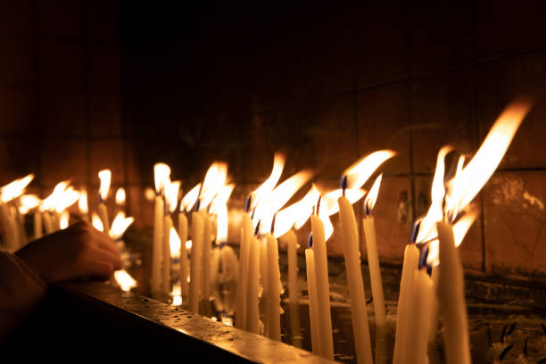 istock Visit the temple (the church), to light the candles on the stand. 1134090806