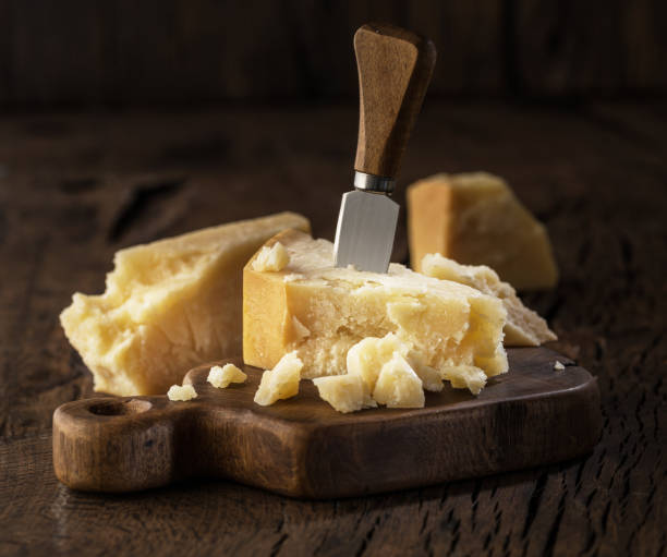 istock Piece of Parmesan cheese and cheese knife. 1134093384
