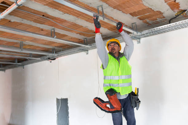 istock Construction worker, Making walls from gypsum plasterboard or drywall 1134093485